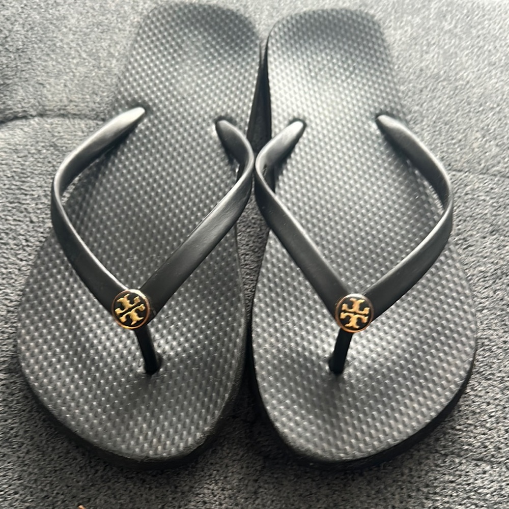 Tory Burch Black and Gold Flip Flops